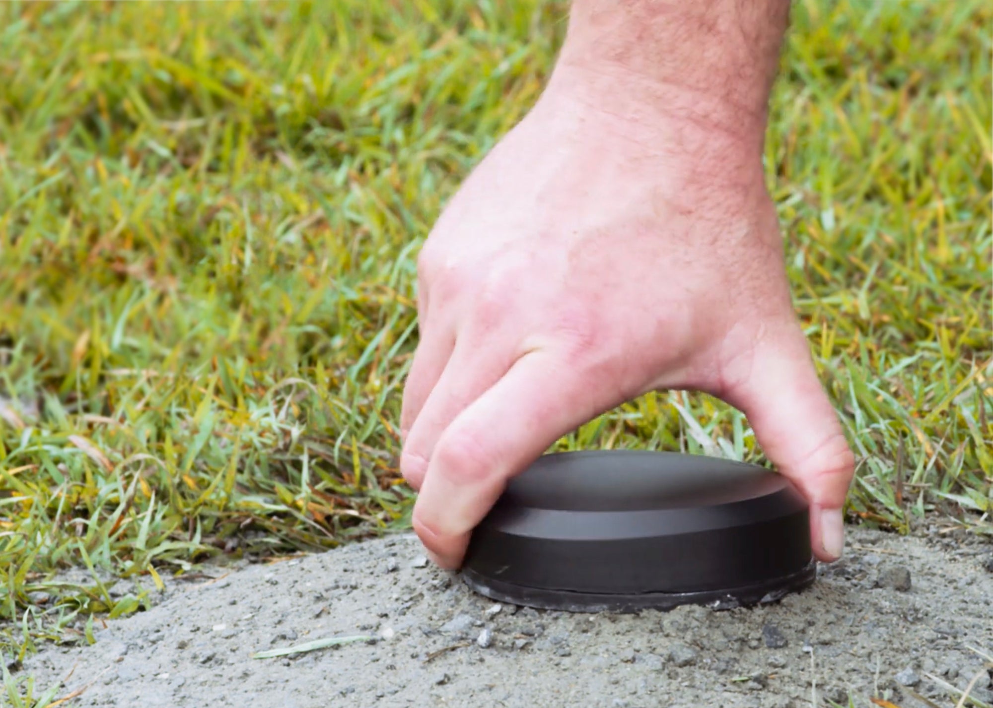 Hills Rotary Clothesline Ground Socket installed in ground